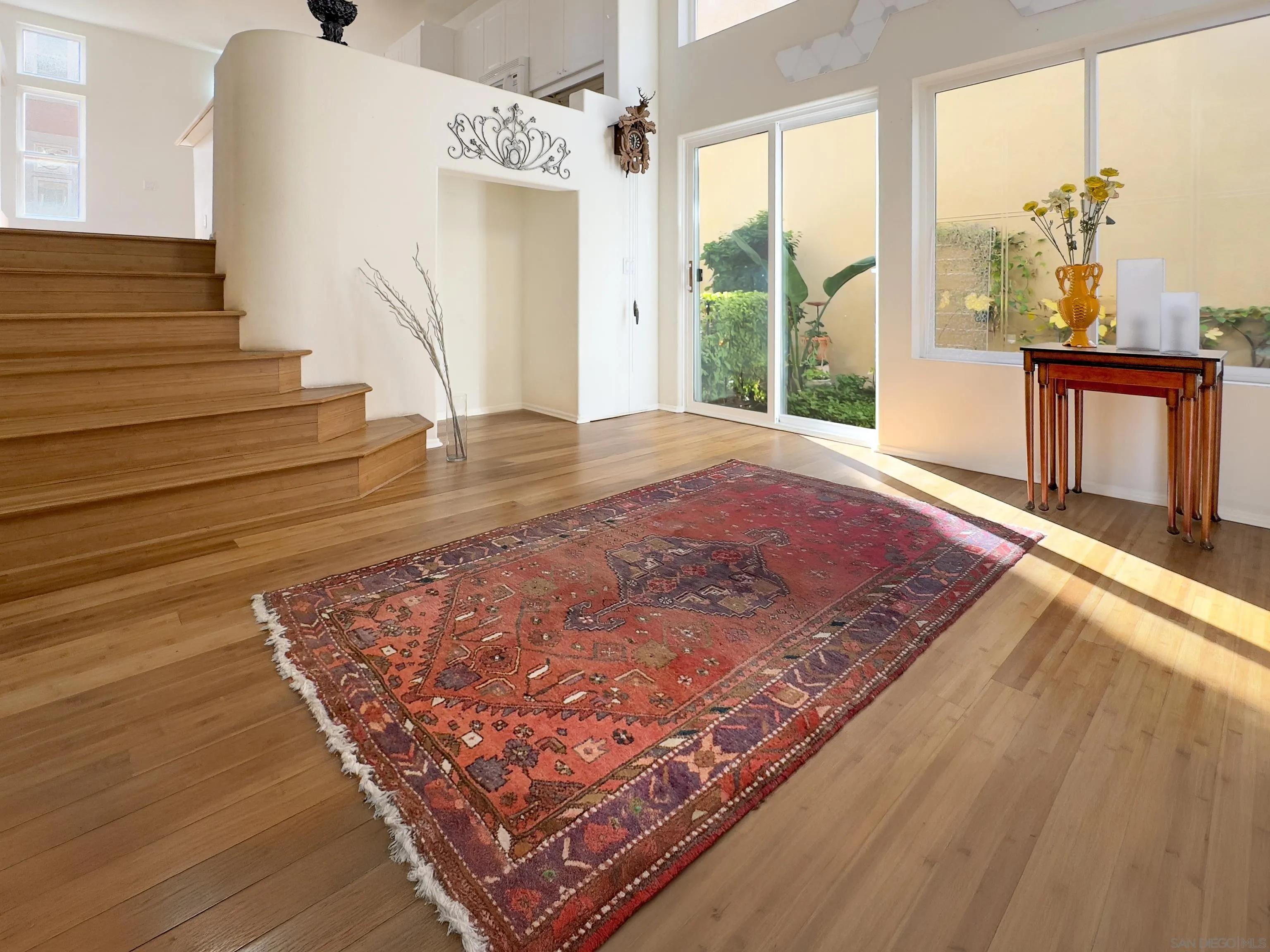 12654 Carmel Country Road, Unit 91 San Diego, CA 92130 - Photo 5 of 22 a view of a hallway with windows