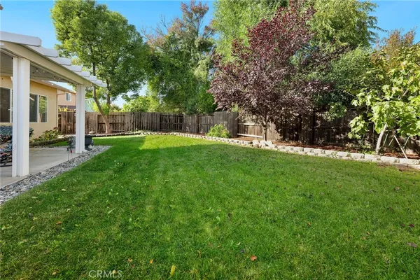 a view of a backyard with a garden