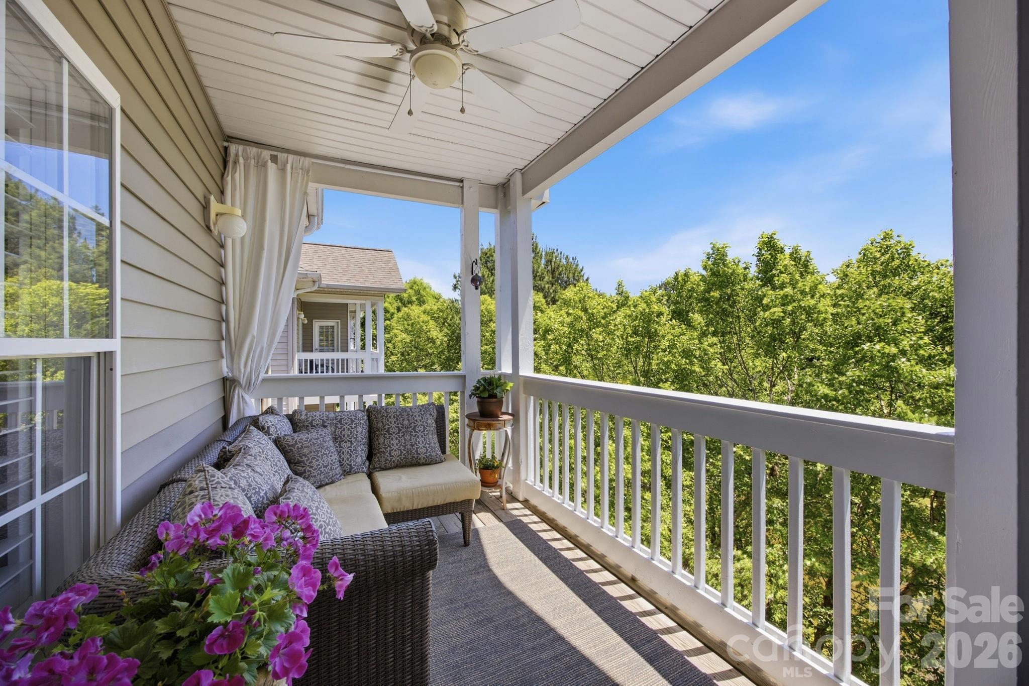 8942 Rosalyn Glen Road Cornelius, NC 28031 - Photo 42 of 47 a balcony with furniture