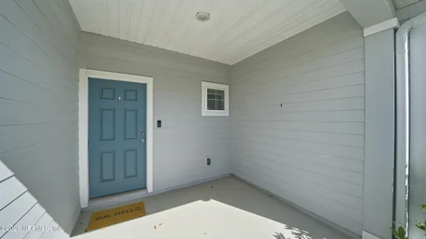 a view of a house with a patio