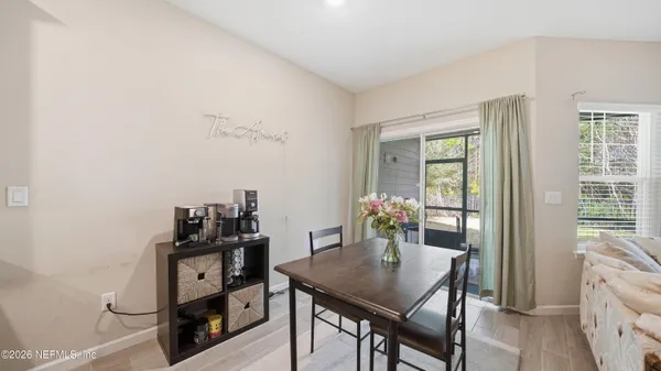 a view of a workspace with furniture