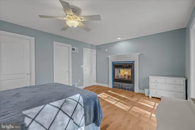 a bathroom with a sink and a refrigerator