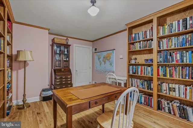 a bathroom with a sink a mirror and a toilet