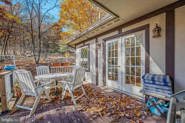 a view of street with wooden fence