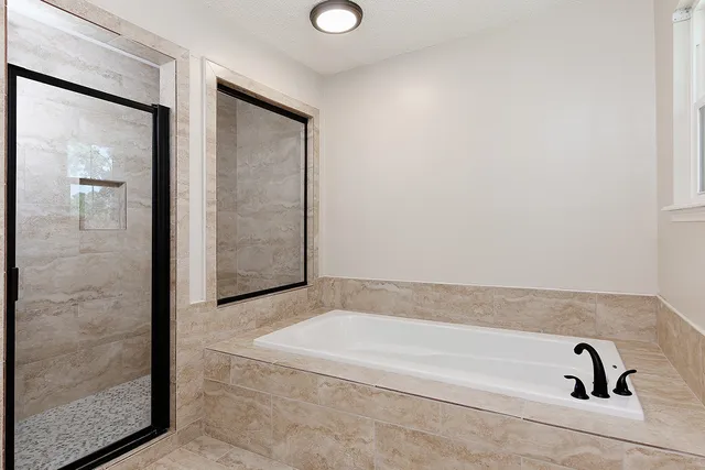 a bathroom with bathtub