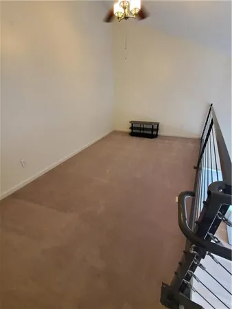 a view of a workspace with furniture