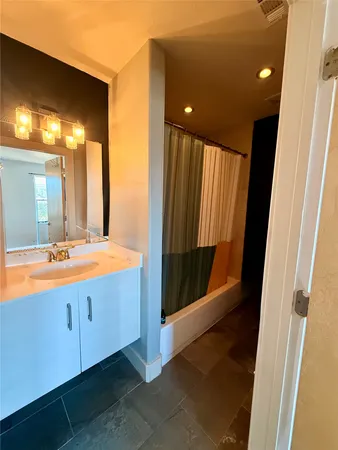 a bathroom with a toilet and a sink