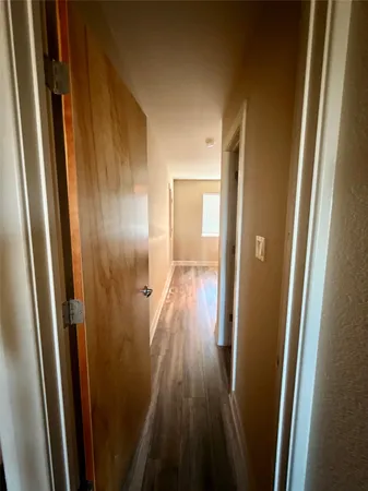 a bathroom with a toilet and a bathtub
