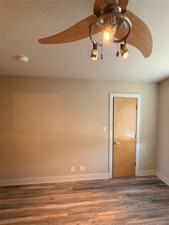 a bathroom with a toilet and a bathtub
