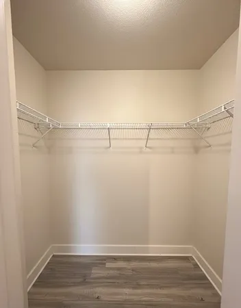 a view of a room with racks on the wall