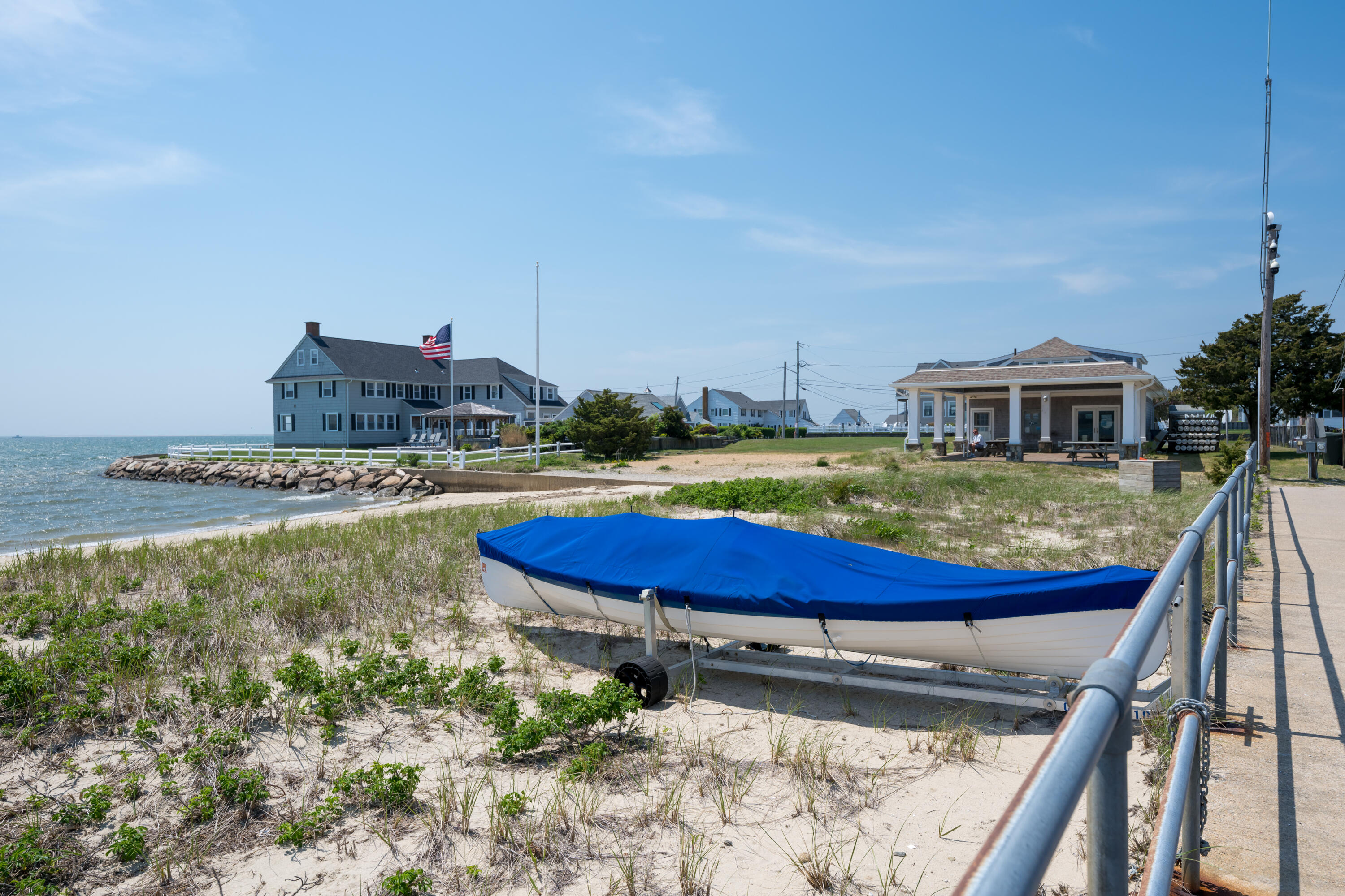 111 Lewis Road West Yarmouth, MA 02673 - Photo 42 of 43 a view of a swimming pool with a lounge chair