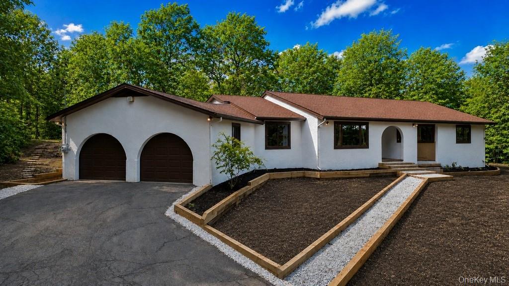 18 Hillside View Road Mahopac, NY 10541 - Photo 1 of 42 a view of a house with a yard plants and large tree