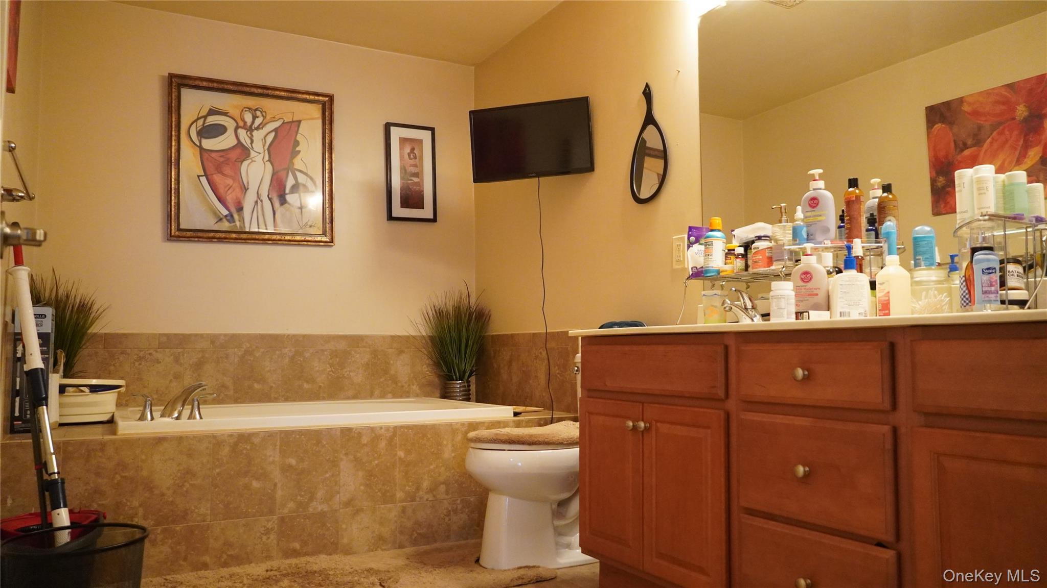 1402 Hawthorn Way New Windsor, NY 12553 - Photo 17 of 25 a bathroom with a sink mirror and toilet