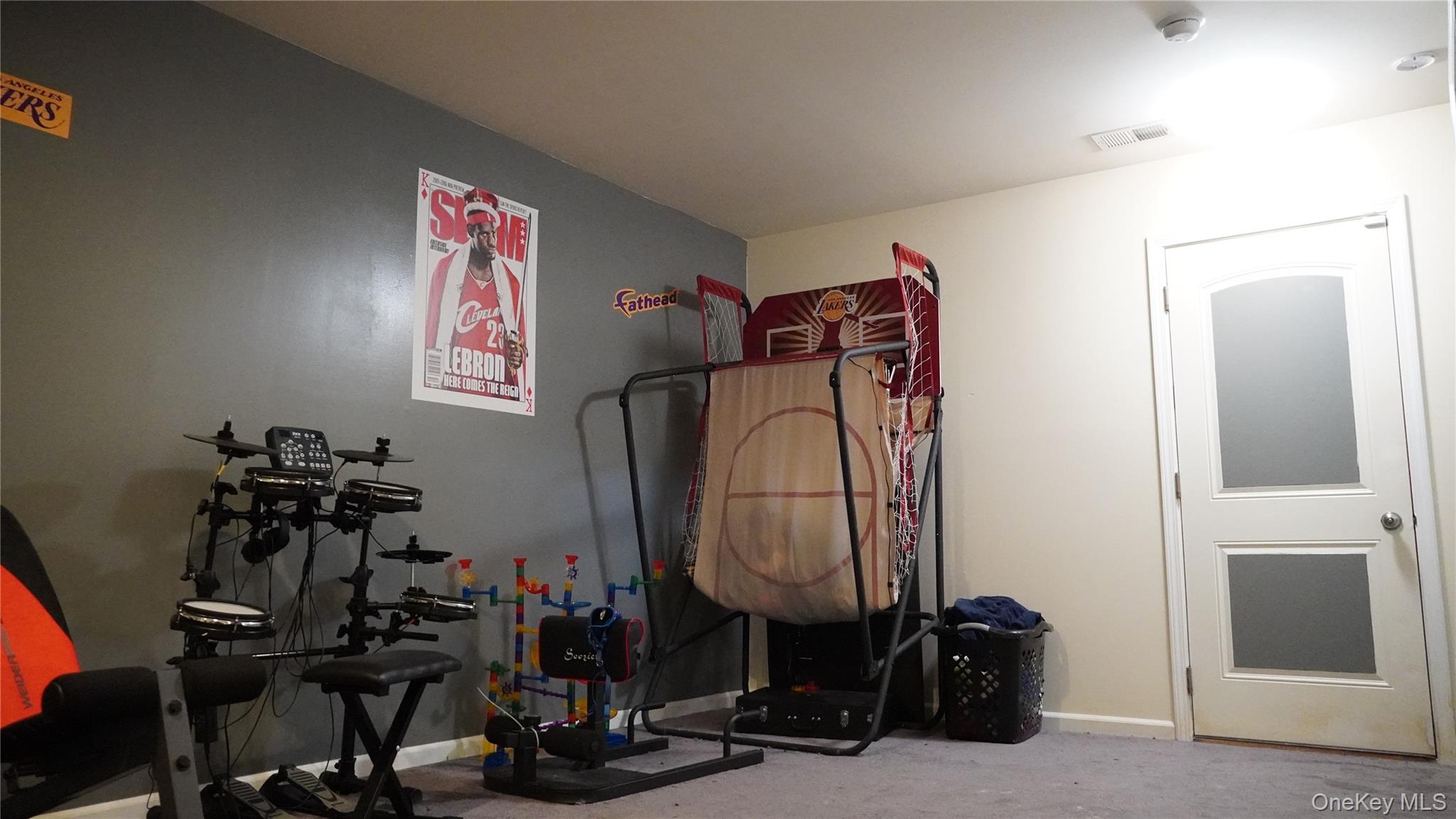 1402 Hawthorn Way New Windsor, NY 12553 - Photo 23 of 25 a view of a room with gym equipment