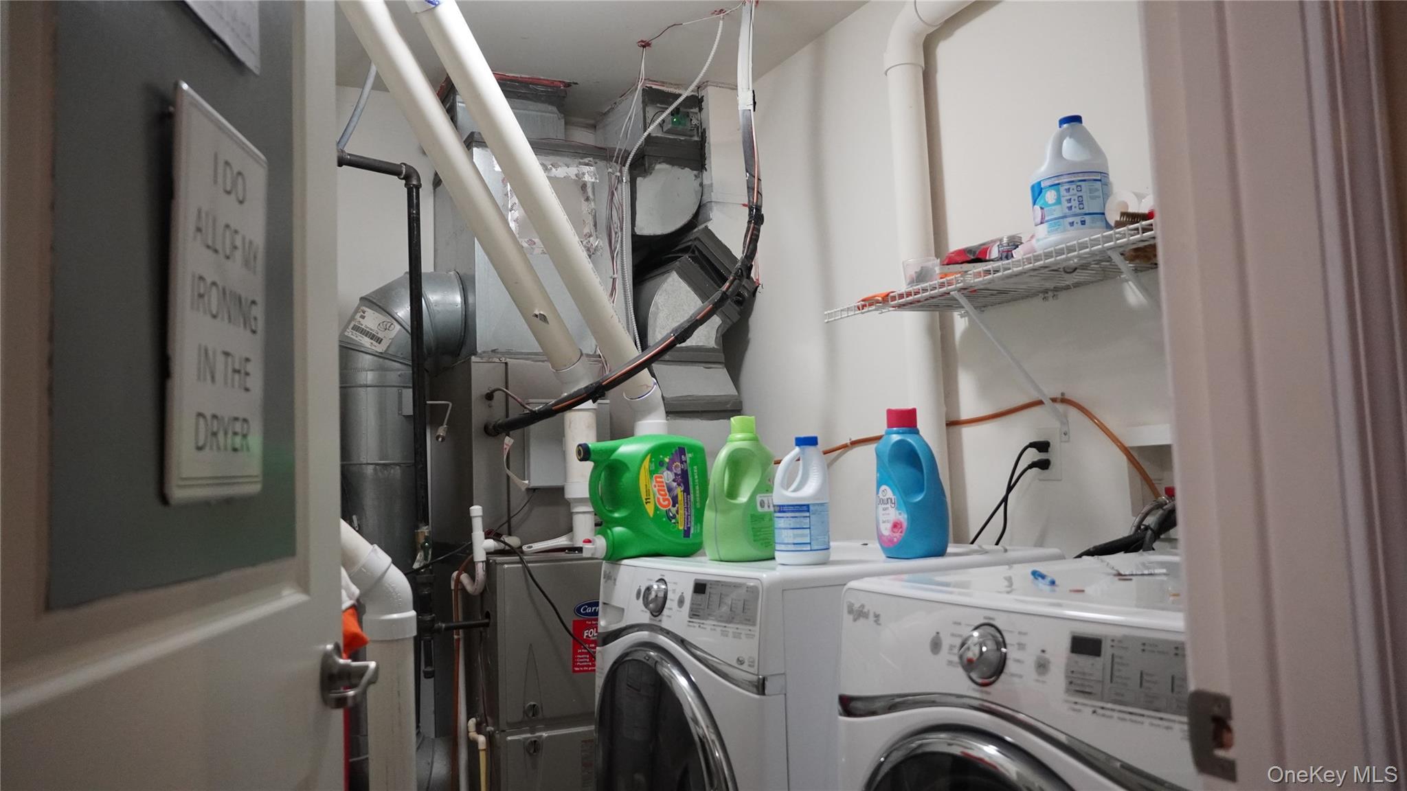 1402 Hawthorn Way New Windsor, NY 12553 - Photo 25 of 25 a view of storage and utility room with washer and dryer