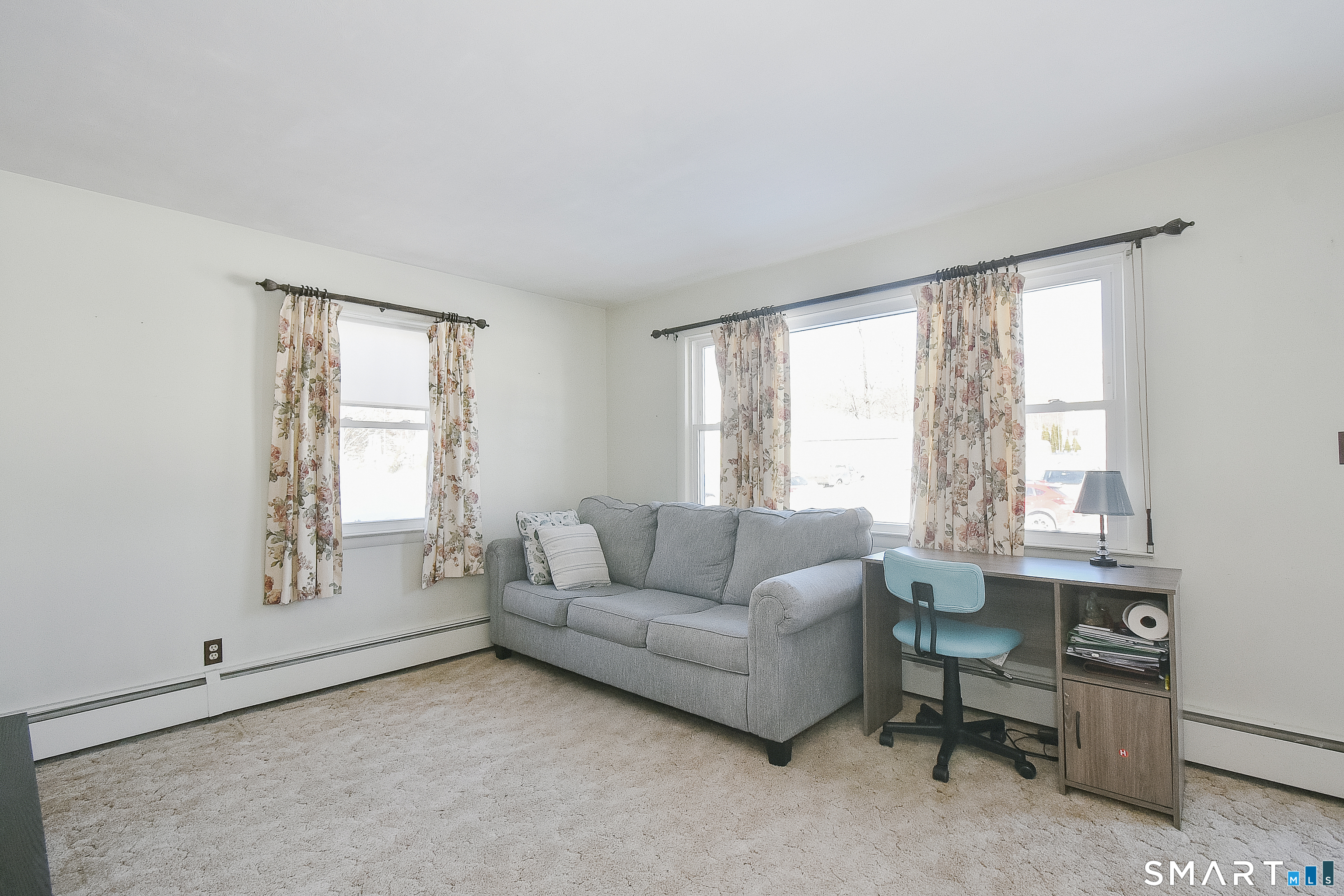 59 Maurice Street Bristol, CT 06010 - Photo 7 of 19 a living room with furniture and a window