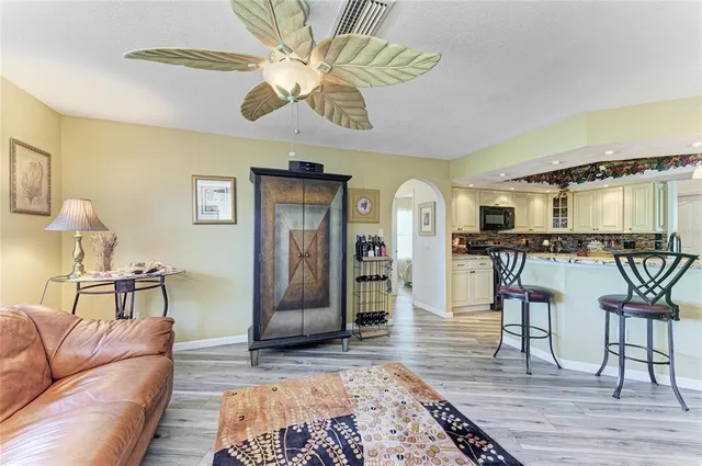 a bathroom with a shower toilet and sink