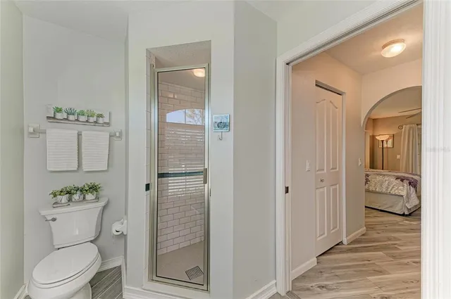 a view of a patio with a table and chairs