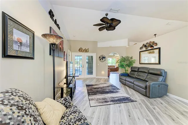 a bedroom with furniture and a window