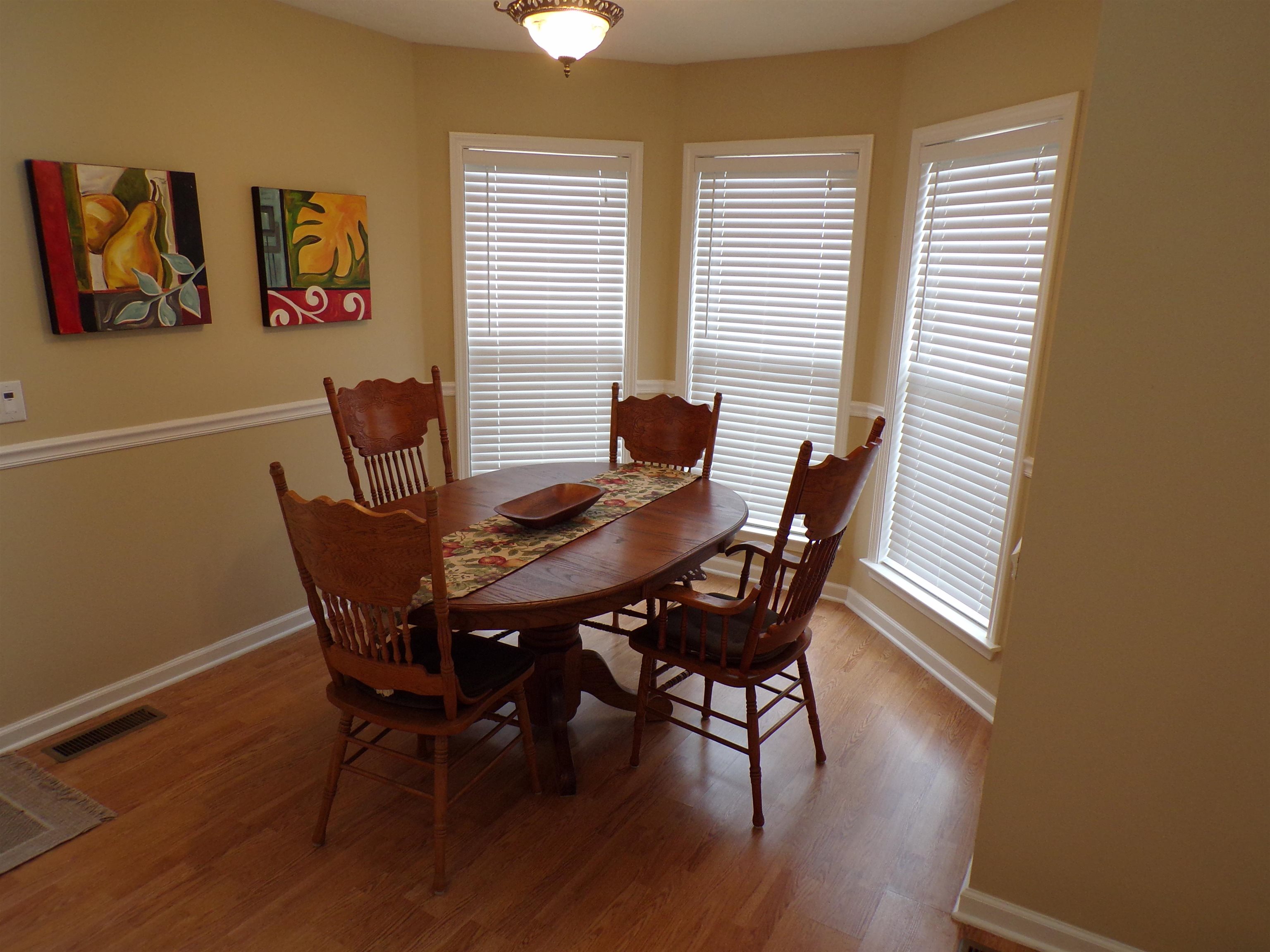 265 Missabbey Lane Counce, TN 38326 - Photo 8 of 21 a view of a dining room with furniture and wooden floor