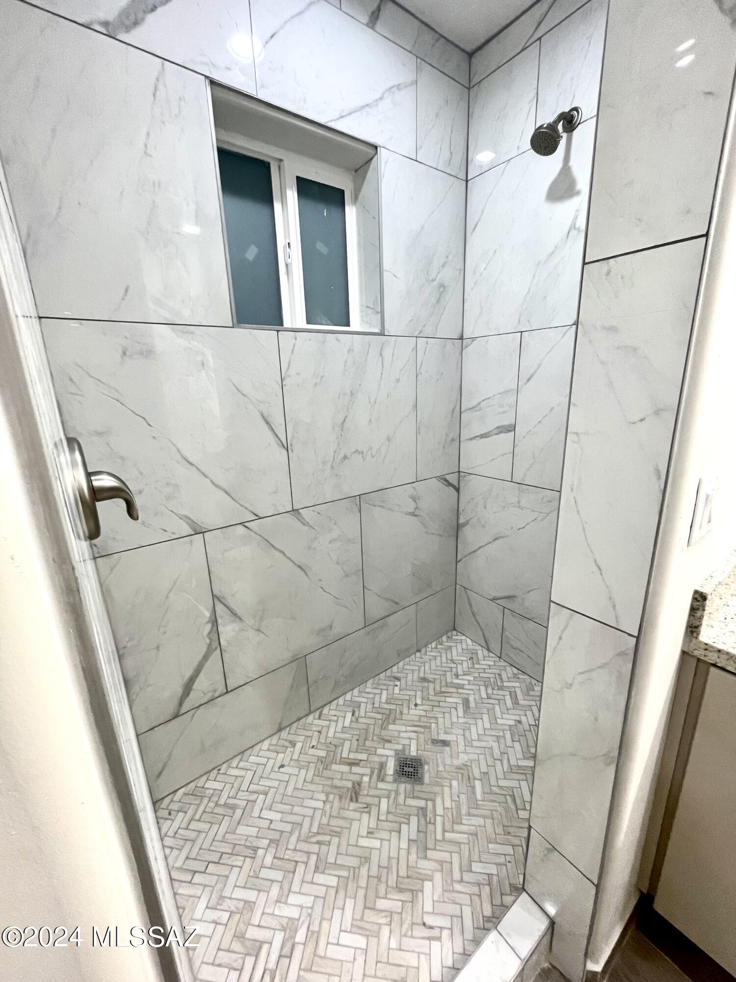 1049 Camino Estrella Rio Rico, AZ 85648 - Photo 18 of 28 a bathroom with a shower