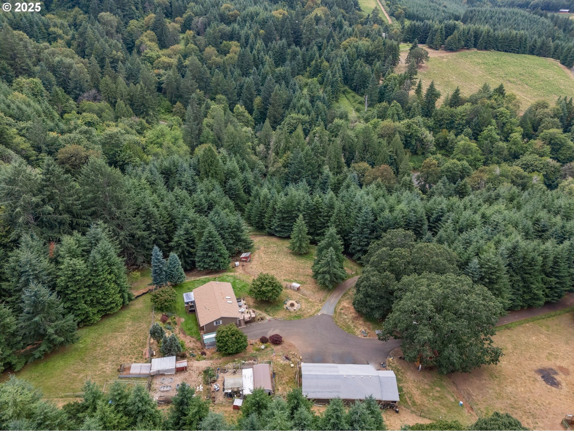 19791 Northeast Sunnycrest Road Newberg, OR 97132 - Photo 32 of 40 an aerial view of a house with a yard