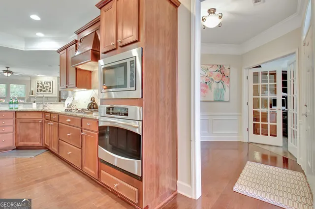a living room filled with furniture and a potted plant
