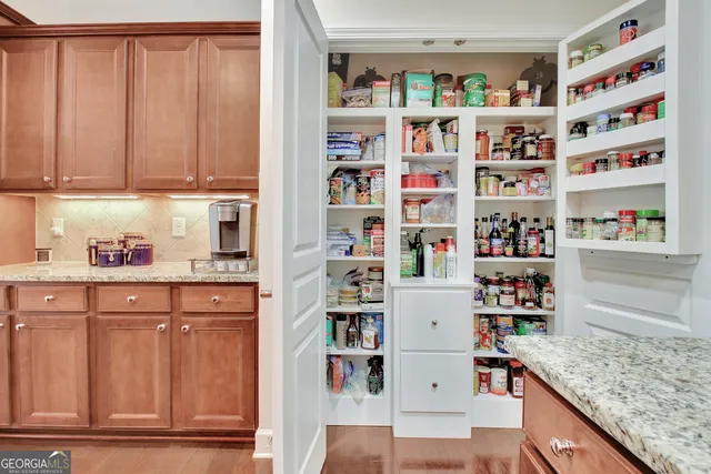 a bathroom with a shower and a sink