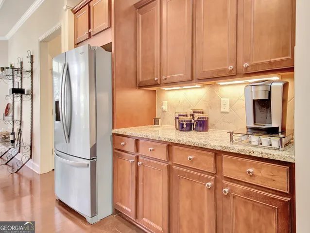a large bathroom with a large mirror vanity and sink