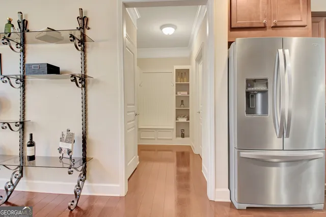 a view of a room with furniture and a window