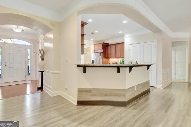 a view of a backyard with large trees