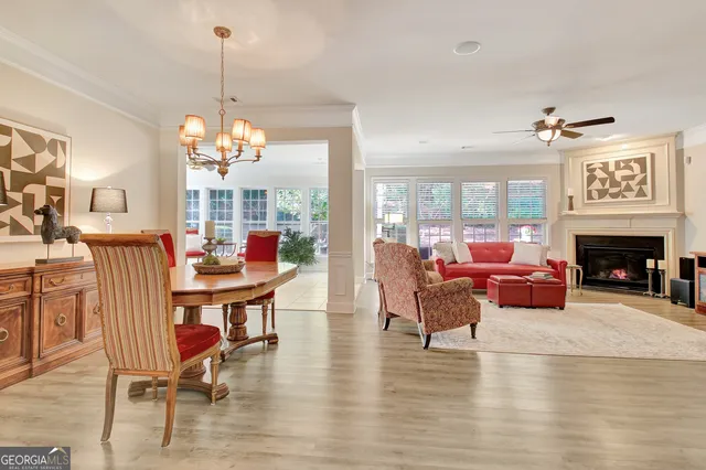a view of a room with lots of gym equipment
