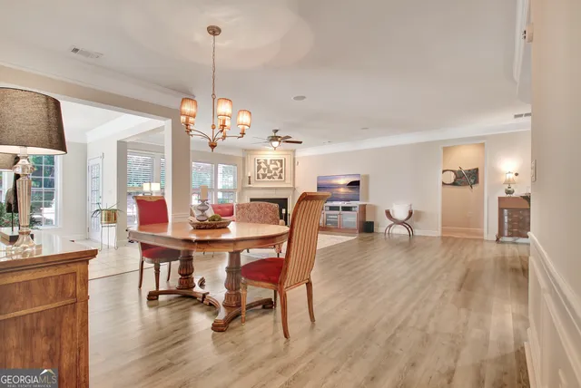 a room with lots of furniture and a large window