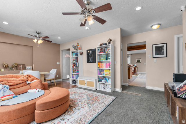 1489 North 400 West Bountiful, UT 84010 - Photo 4 of 47 Open-concept living space featuring wood-finish flooring, recessed lighting, and ceiling fans