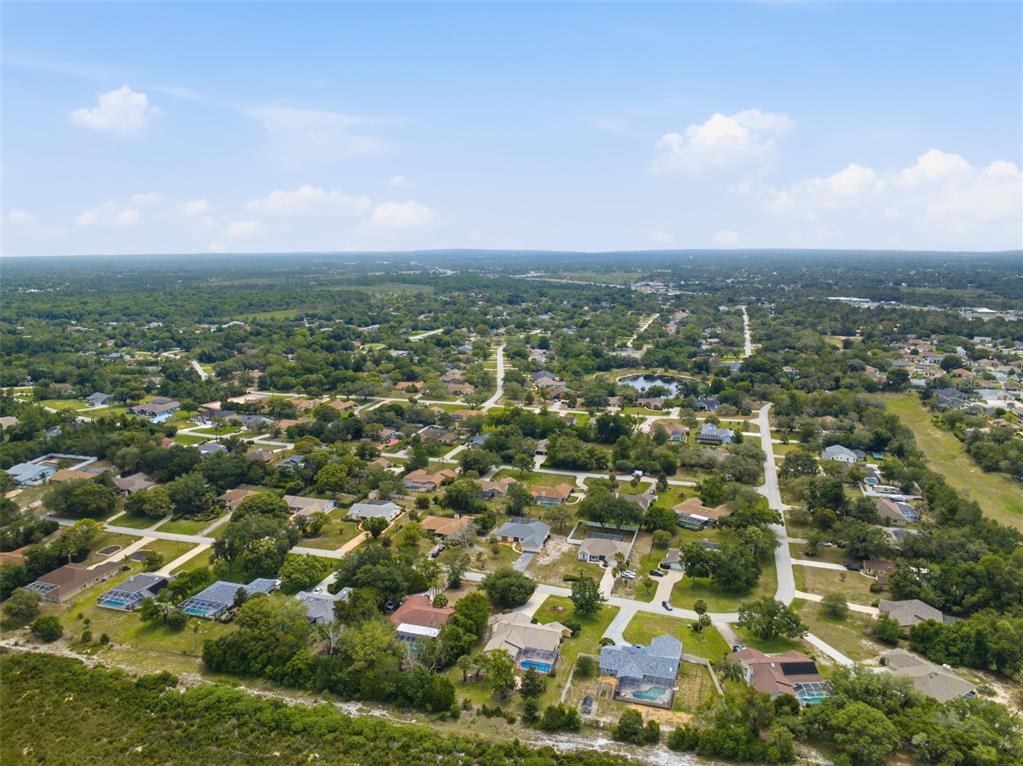 5227 Suwannee Road Weeki Wachee, FL 34607 - Photo 57 of 62 an aerial view of multiple house