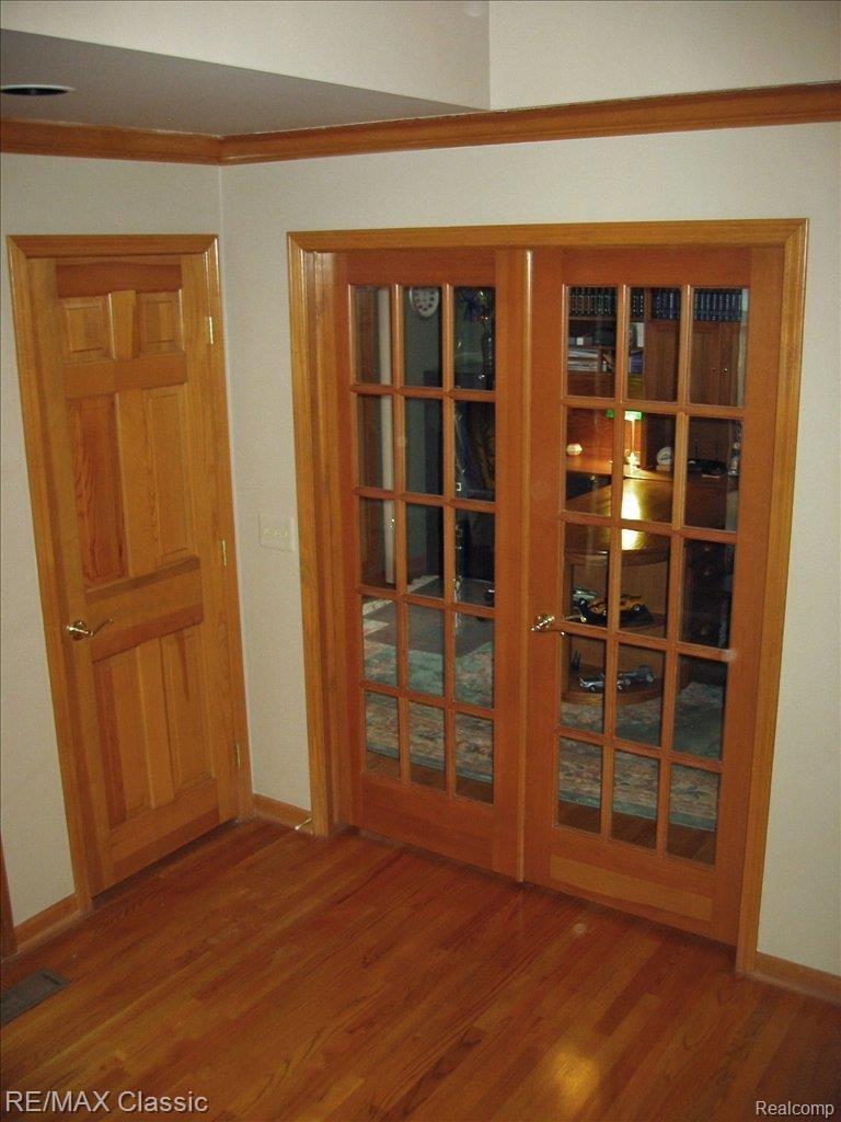 6187 Country Ridge Drive Troy, MI 48098 - Photo 10 of 17 Glass Doors to Study