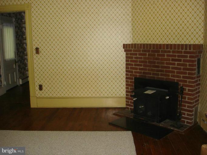 7439 Dion Road Denton, MD 21629 - Photo 2 of 27 Fireplace with Insert