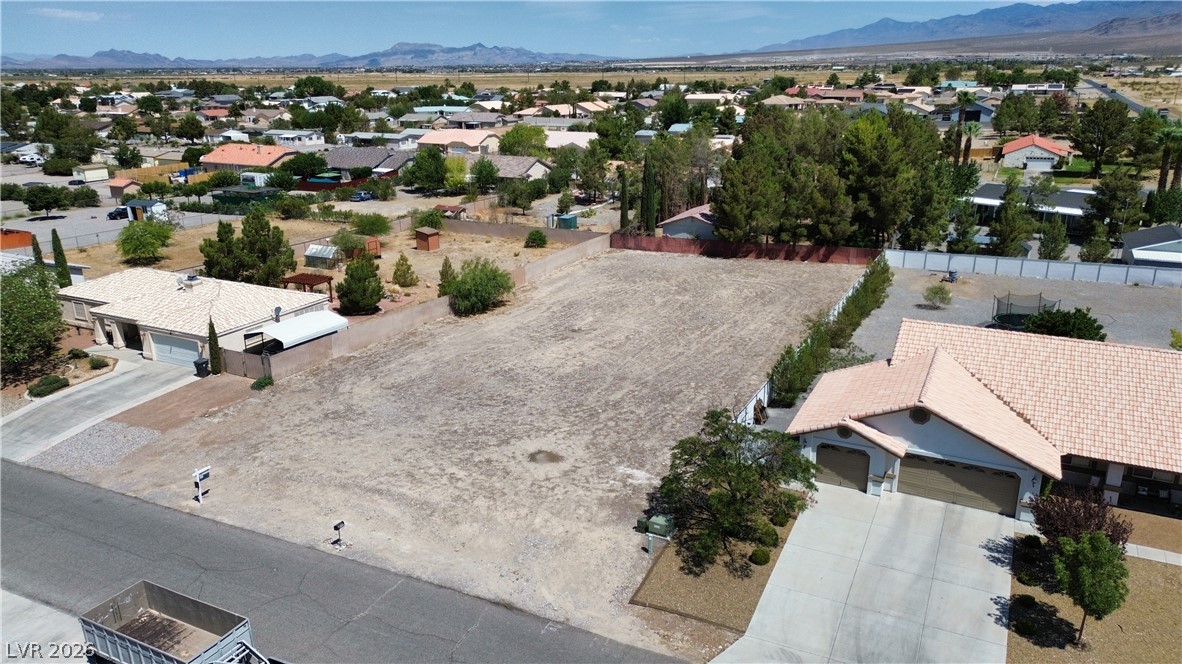 5960 Doubletree Road Pahrump, NV 89061 - Photo 3 of 4 A spacious, buildable lot awaits your vision, nestled in a community with mountain backdrops.