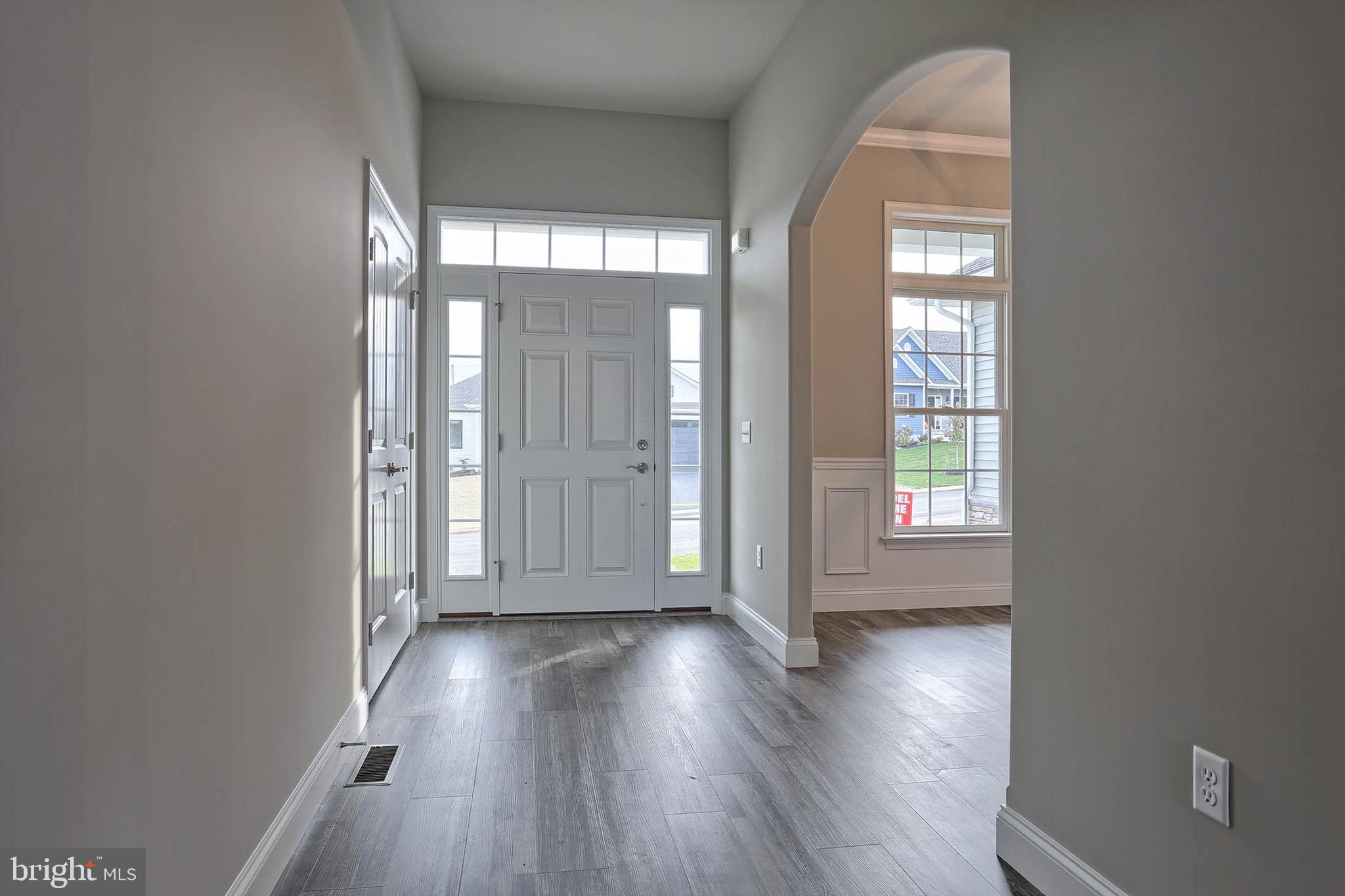 21 Rolling Meadow Road Lebanon, PA 17046 - Photo 5 of 37 an empty room with wooden floor and windows
