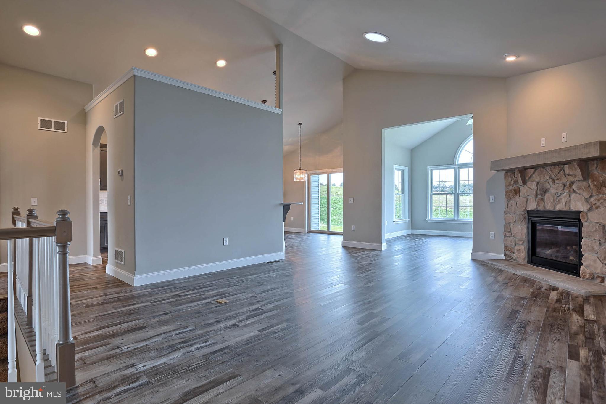 21 Rolling Meadow Road Lebanon, PA 17046 - Photo 10 of 37 a view of a hallway with wooden floor and a fireplace