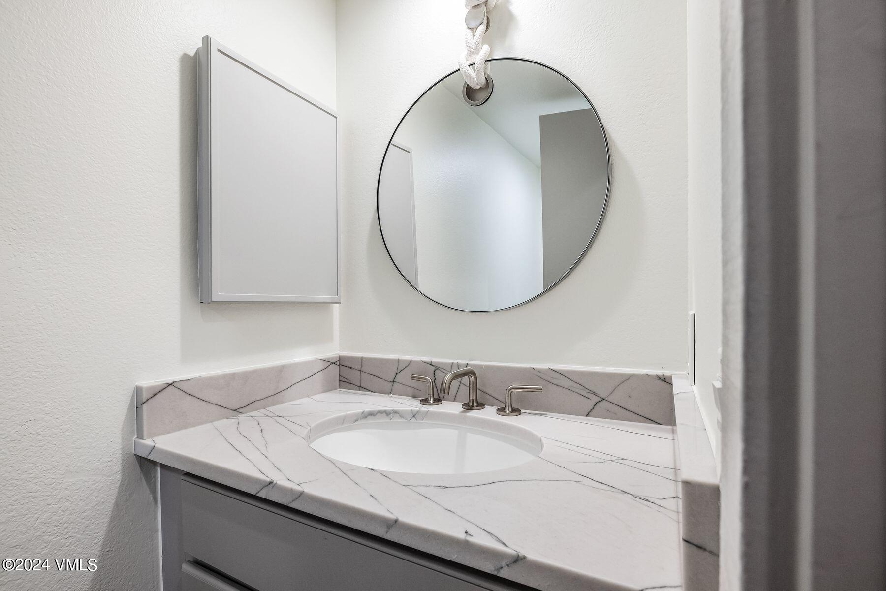 4770 Big Horn Road, Unit H4 Vail, CO 81657 - Photo 18 of 38 Main Level Powder Room