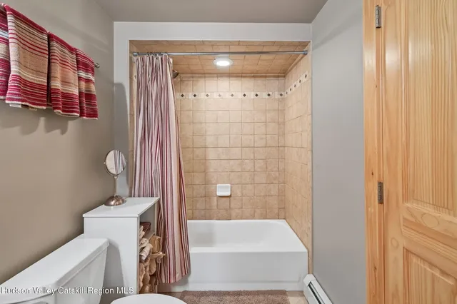 a view of a patio with wooden floor