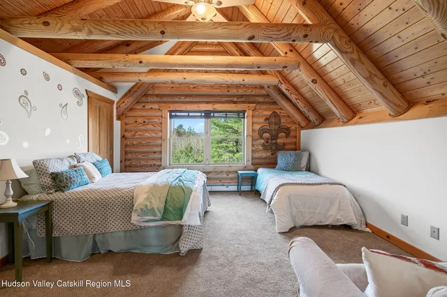 a view of a balcony with chairs