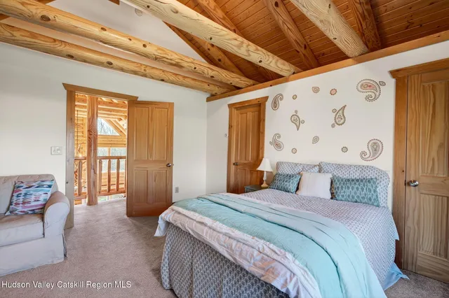 a view of swimming pool with a yard and trees