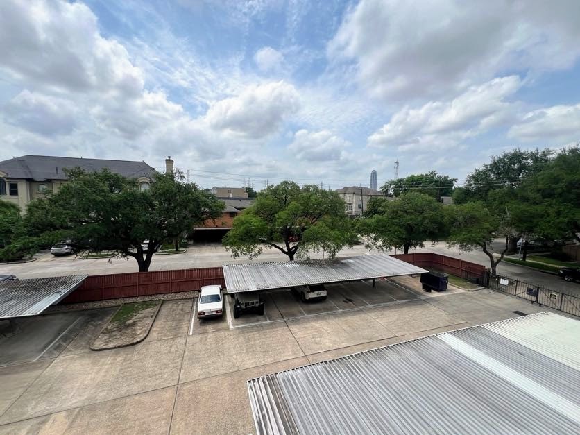 4041 Drake Street, Unit 118 Houston, TX 77005 - Photo 22 of 22 a view of swimming pool outdoor seating and city view