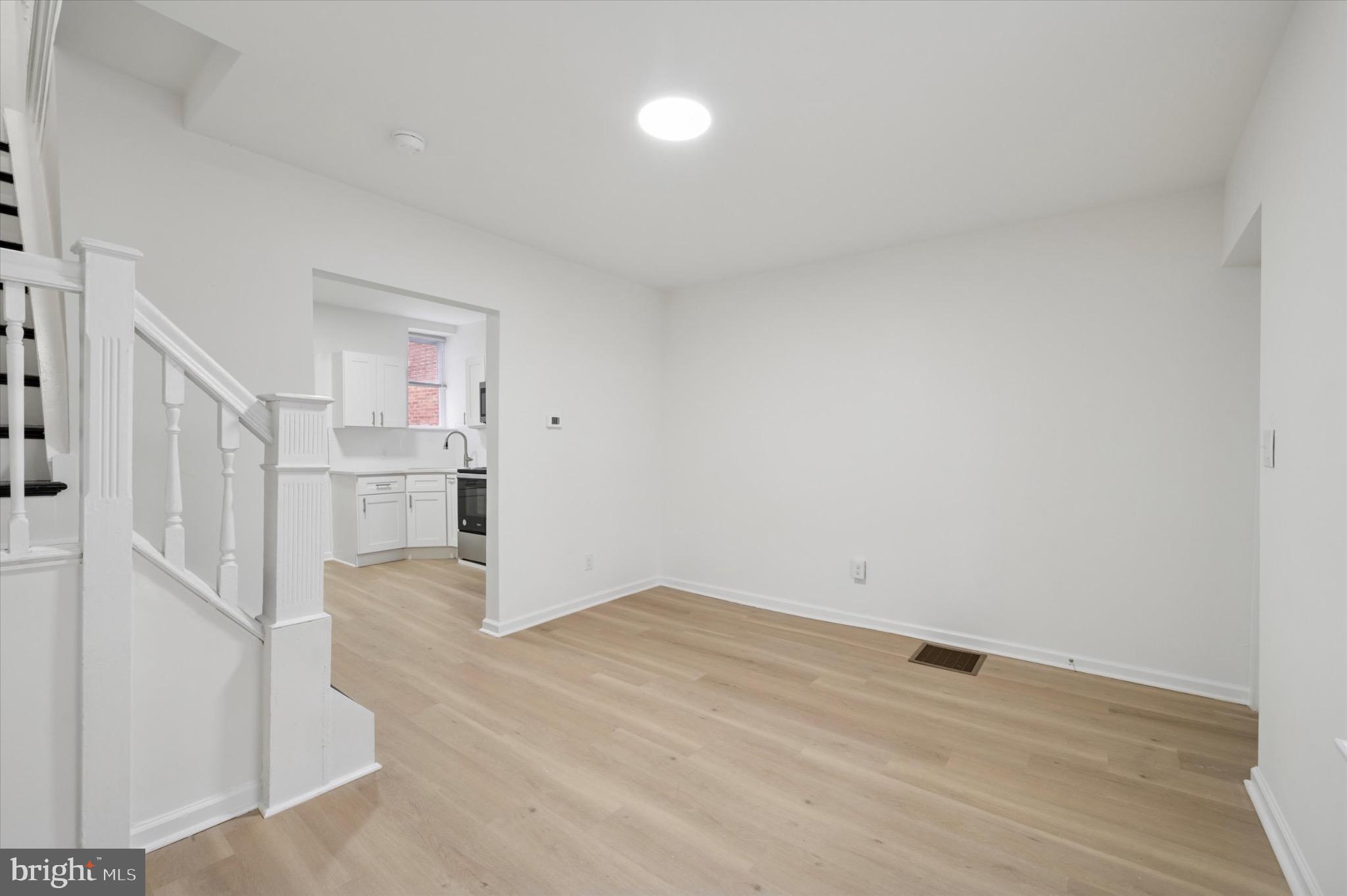 1452 North 56th Street Philadelphia, PA 19131 - Photo 4 of 12 wooden floor in an empty room