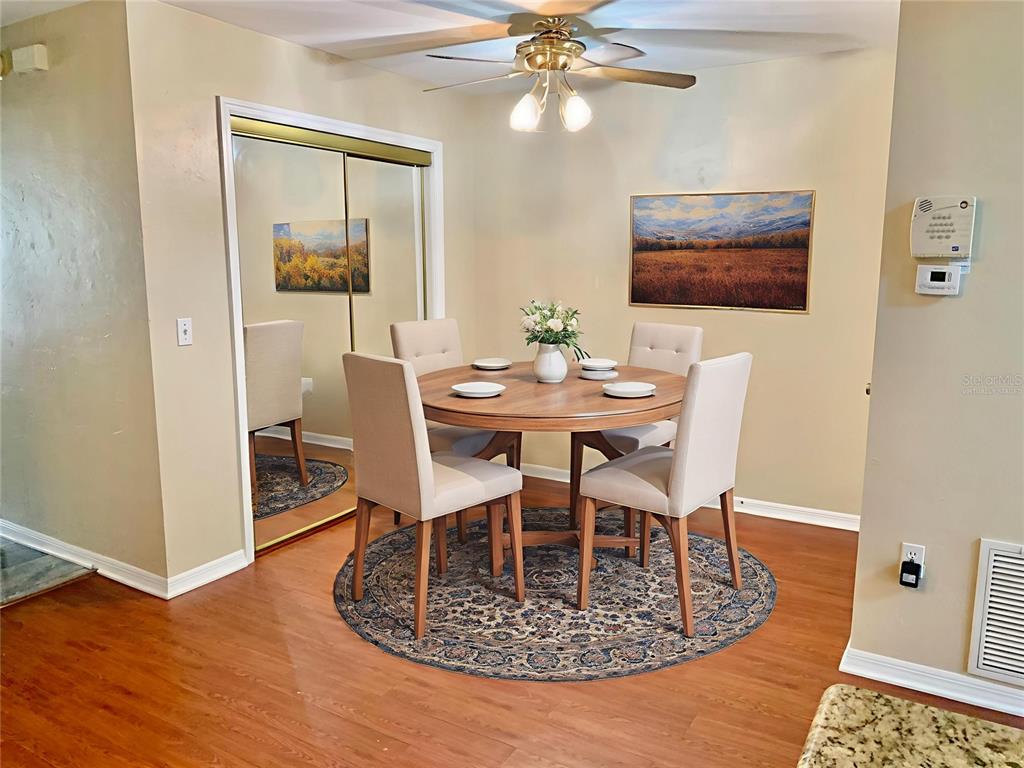 5268 Southwest 97 Way Gainesville, FL 32608 - Photo 19 of 33 a view of a dining room with furniture