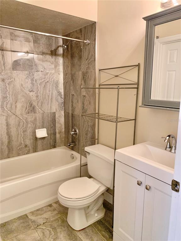 5268 Southwest 97 Way Gainesville, FL 32608 - Photo 26 of 33 a bathroom with a sink toilet and shower