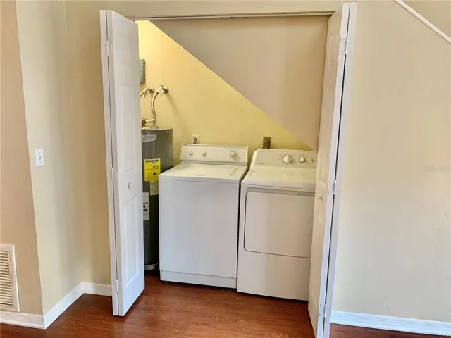 a utility room with dryer and washer