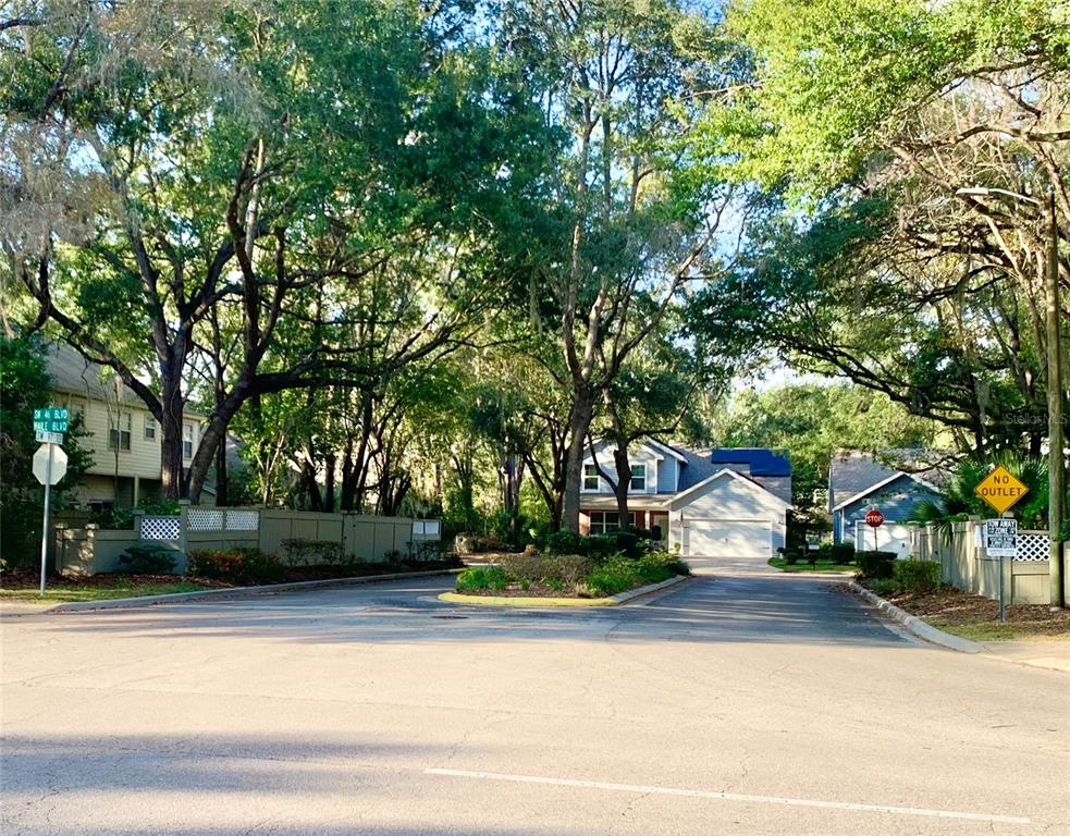 5268 Southwest 97 Way Gainesville, FL 32608 - Photo 33 of 33 a front view of a house with a yard